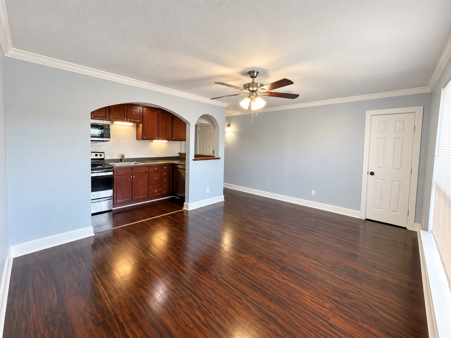 Bright Modern Living Space with Arched Kitchen