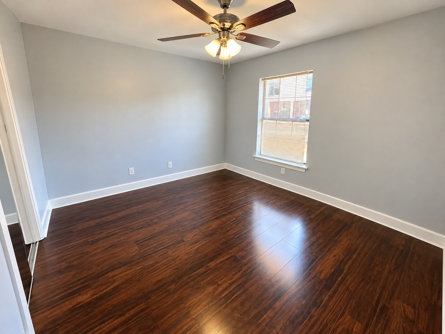 Empty Gray Bedroom with Warm Fan Light
