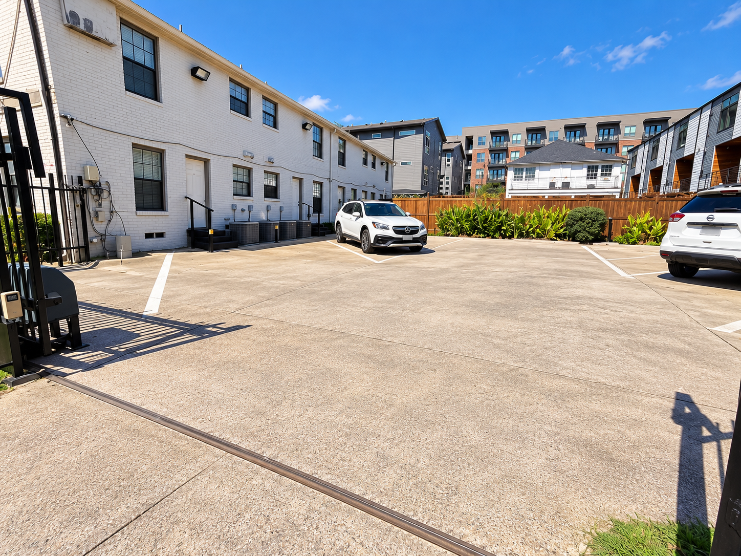 Sunlit Gated Apartment Parking Courtyard